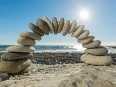 balanced stones on a beach